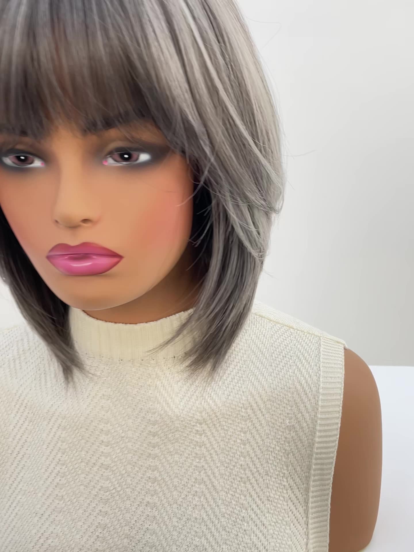 shoulder-length silver grey bob with bangs synthetic wig styling view