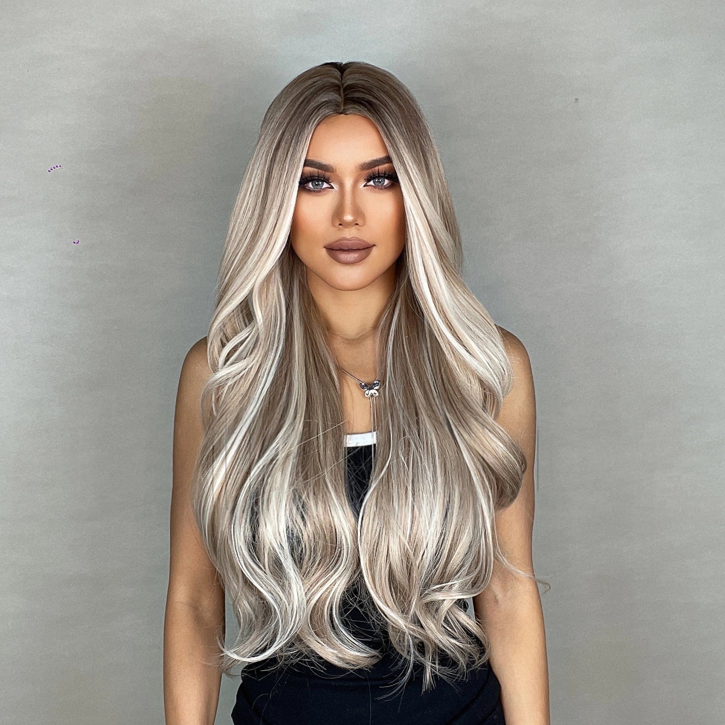 long light ash blonde wavy middle part synthetic wig styling view